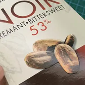 Emboss and UV printing effect on custom chocolate packaging with raised texture