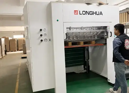 Automatic die cutting machine used for shaping custom chocolate packaging boxes and paperboard packaging in factory production