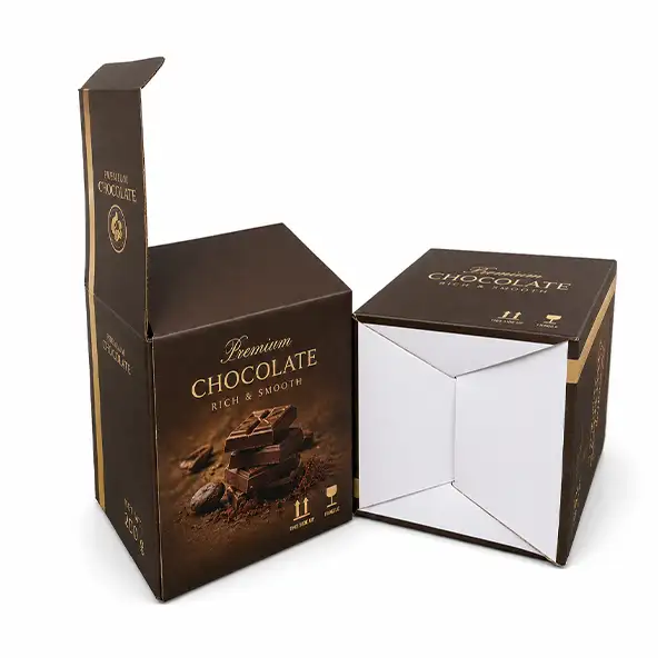 Custom printed brown corrugated chocolate box shown open and upside down with auto-lock bottom and tuck-top closure