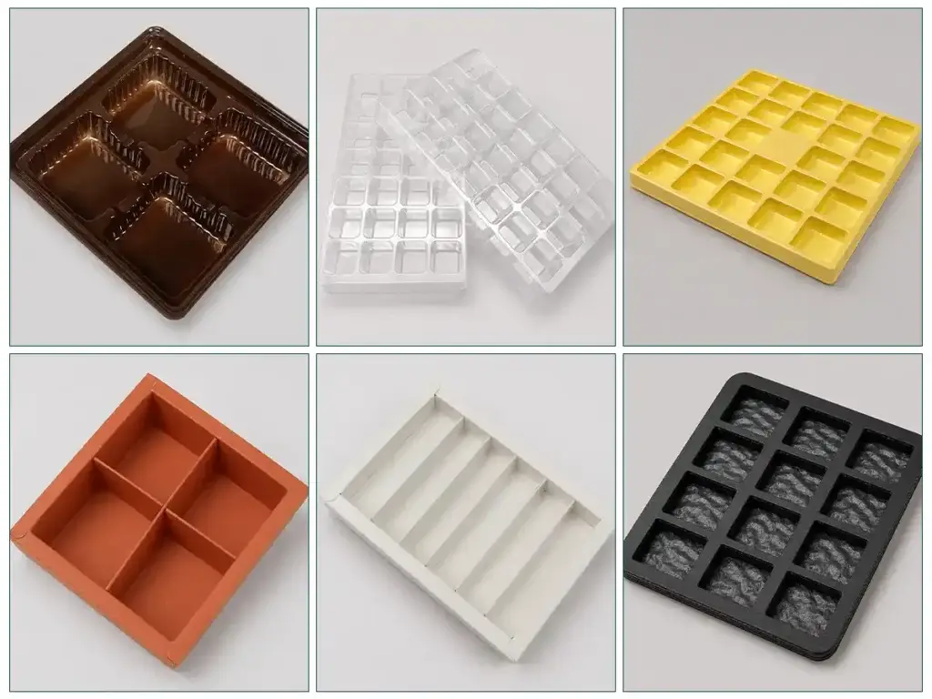 Chocolate box insert options including molded plastic trays, clear cavity trays, paperboard dividers and compartment inserts for assorted chocolates